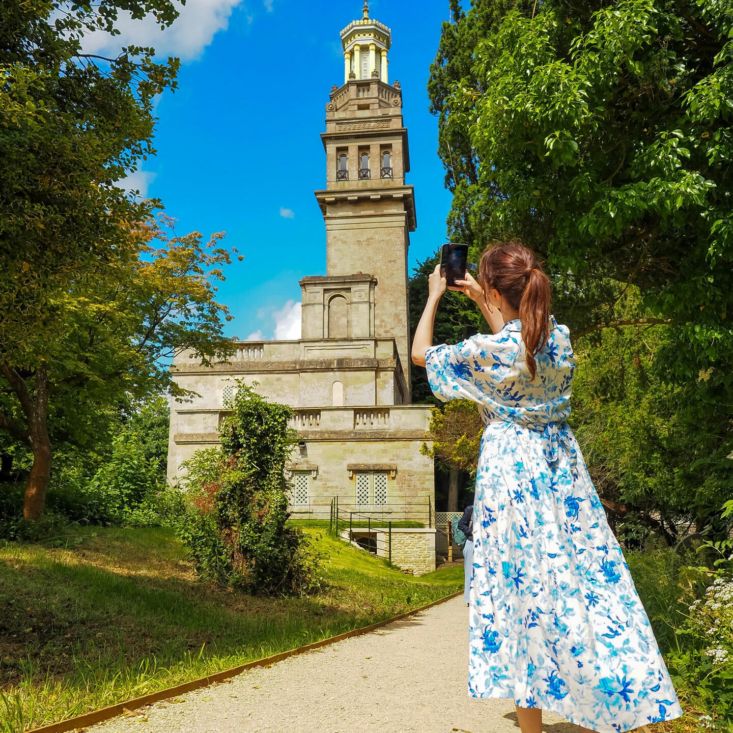 Bath AR Trail, Woman taking a picture of Beckford's Tower