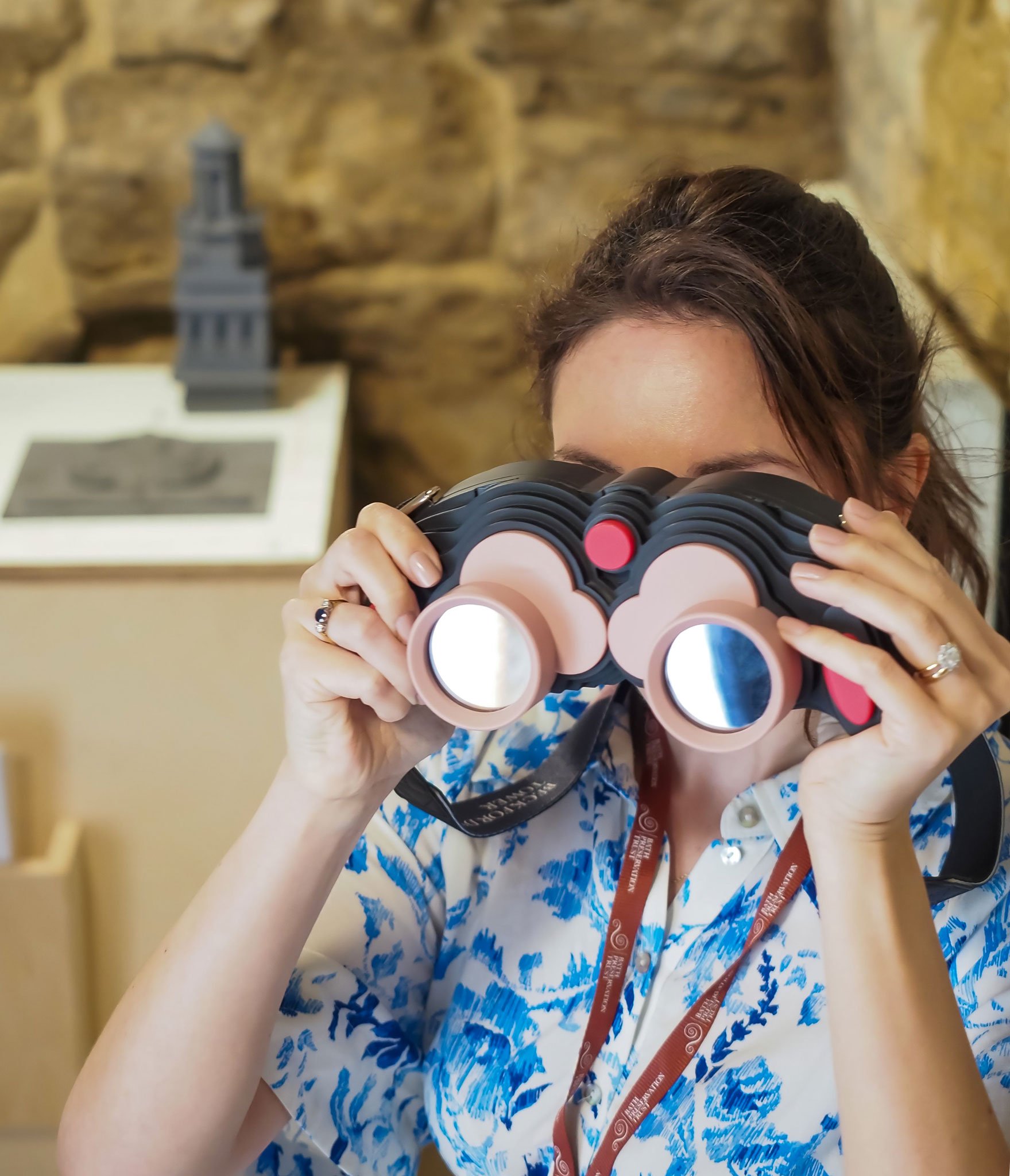 Beckford's Tower Woman looking through AR binoculars, AR tower viewer, VR tower viewer